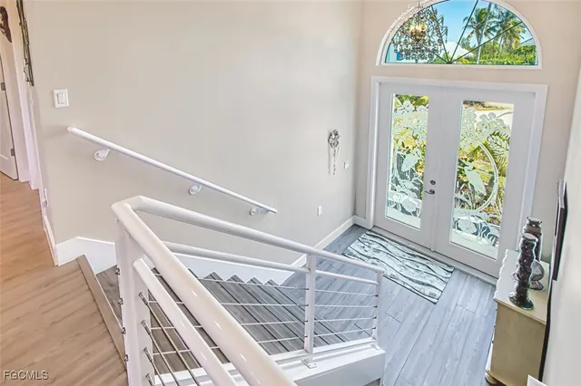 a view of balcony with wooden floor
