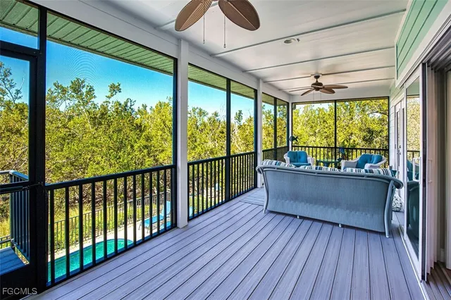 a view of porch with wooden floor
