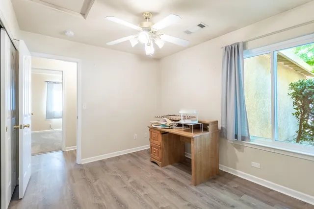 a kitchen with stainless steel appliances granite countertop a stove and a refrigerator