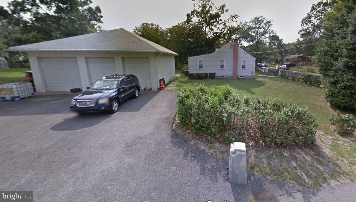 5815 Aley Road Temple Hills, MD 20748 - Photo 25 of 28 Drive way and side of house