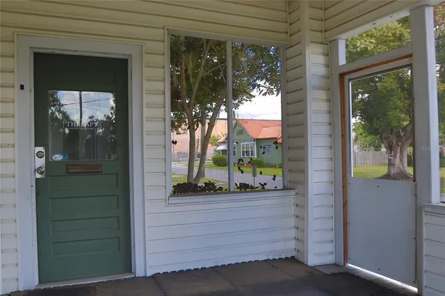 a front view of a house with a porch