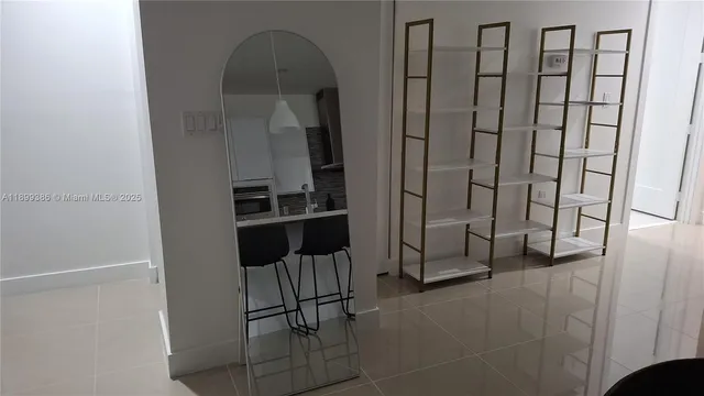 a view of balcony with furniture