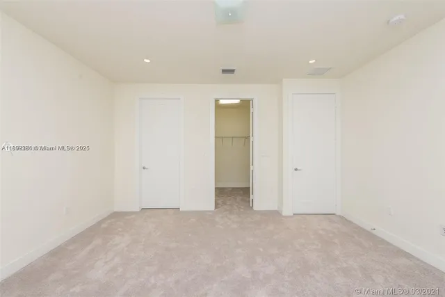 an empty room with an entryway