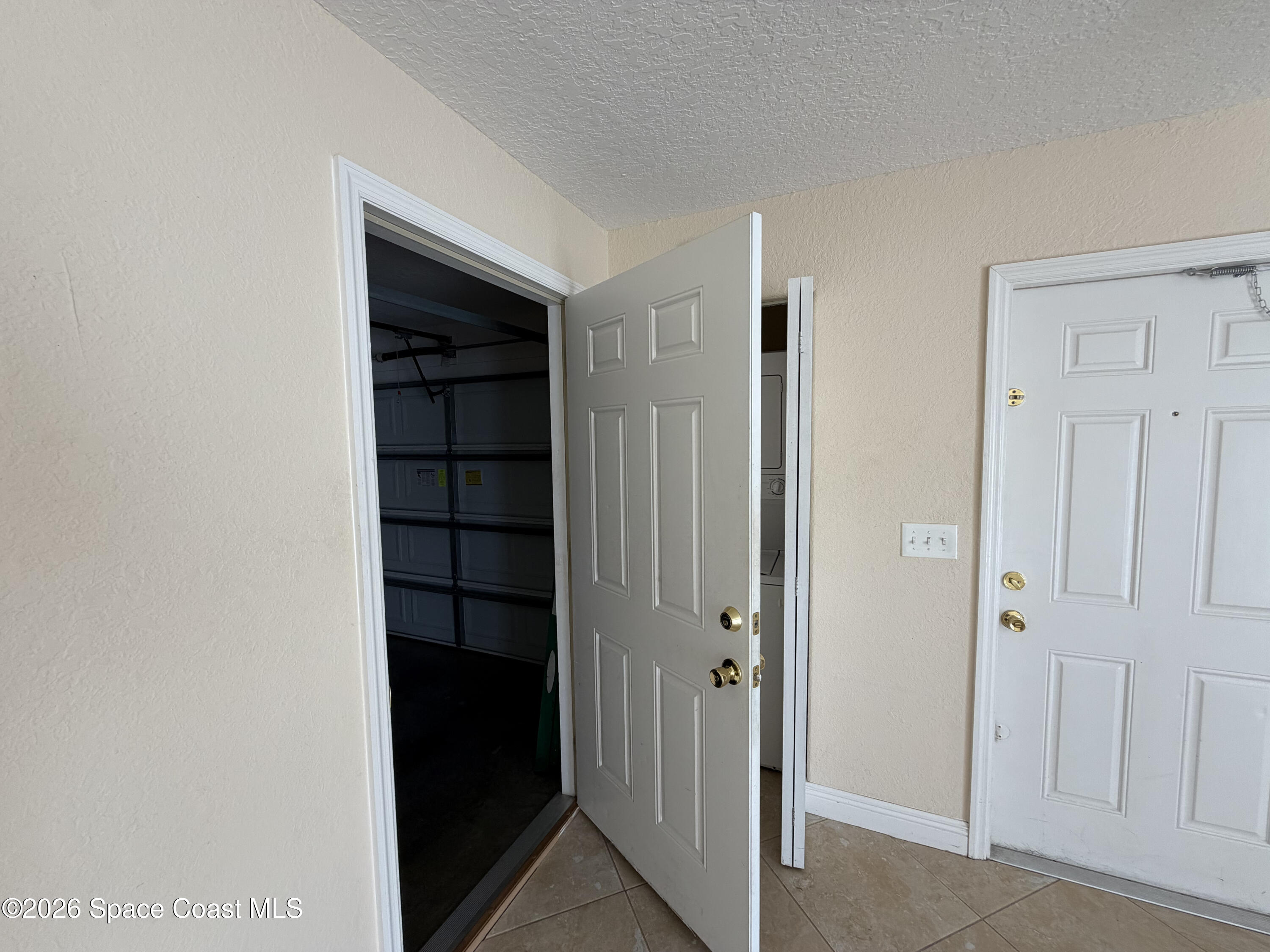 1904 Fletcher Street Melbourne, FL 32901 - Photo 11 of 23 a view of walk in closet with empty racks