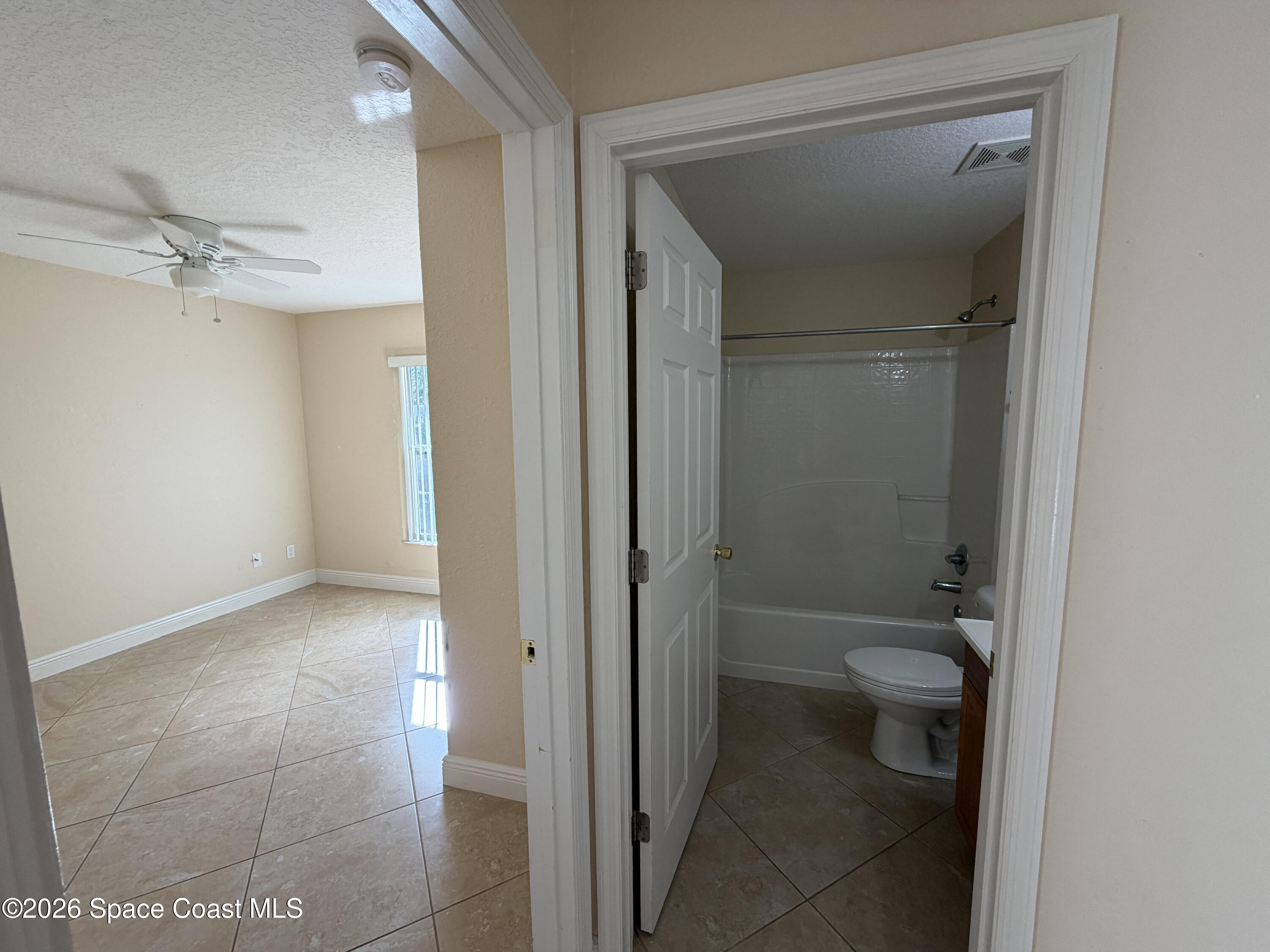 1904 Fletcher Street Melbourne, FL 32901 - Photo 13 of 23 a bathroom that has a toilet in it