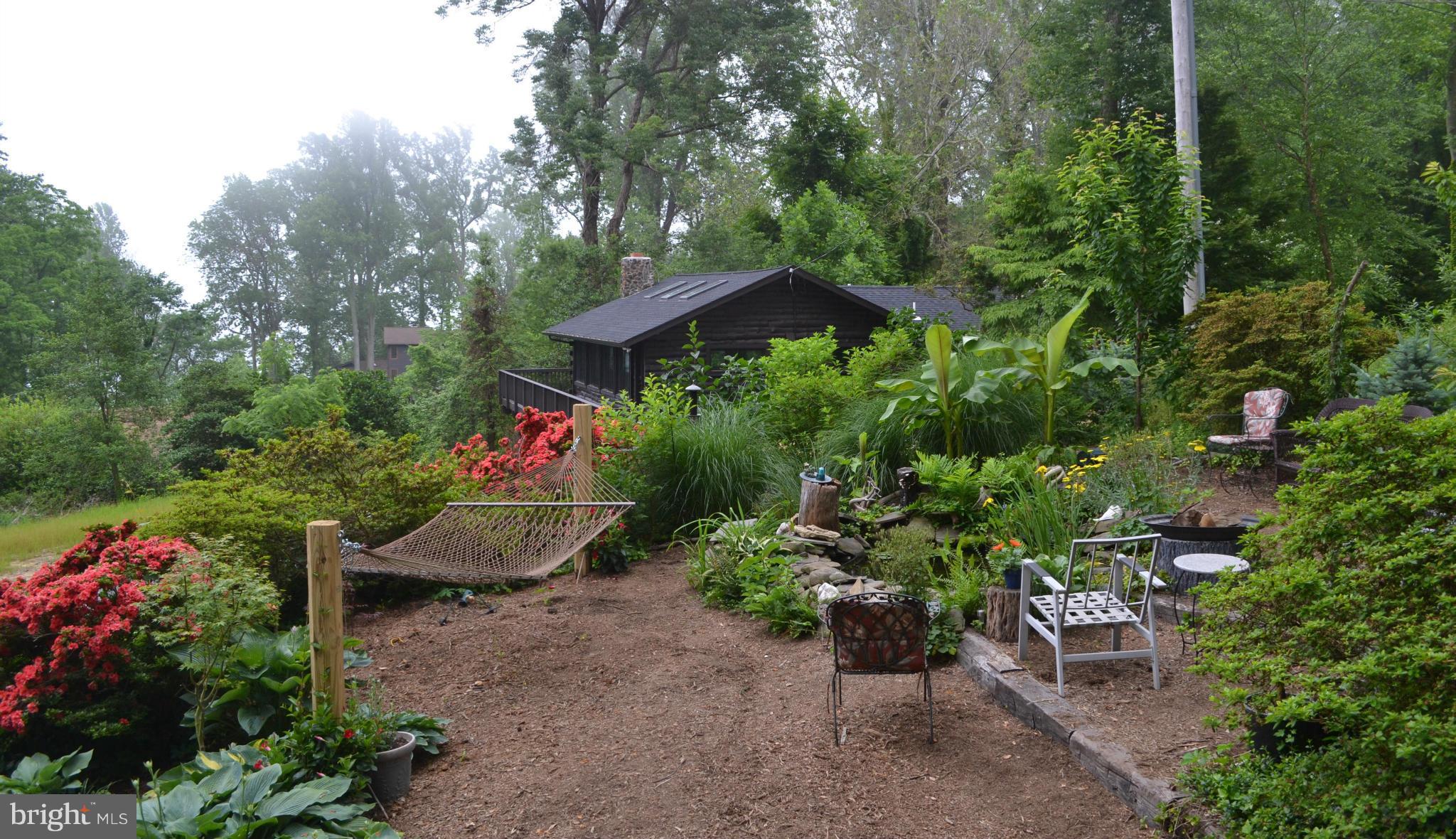 4012 Elder Road Port Republic, MD 20676 - Photo 3 of 25 a garden view with a seating space