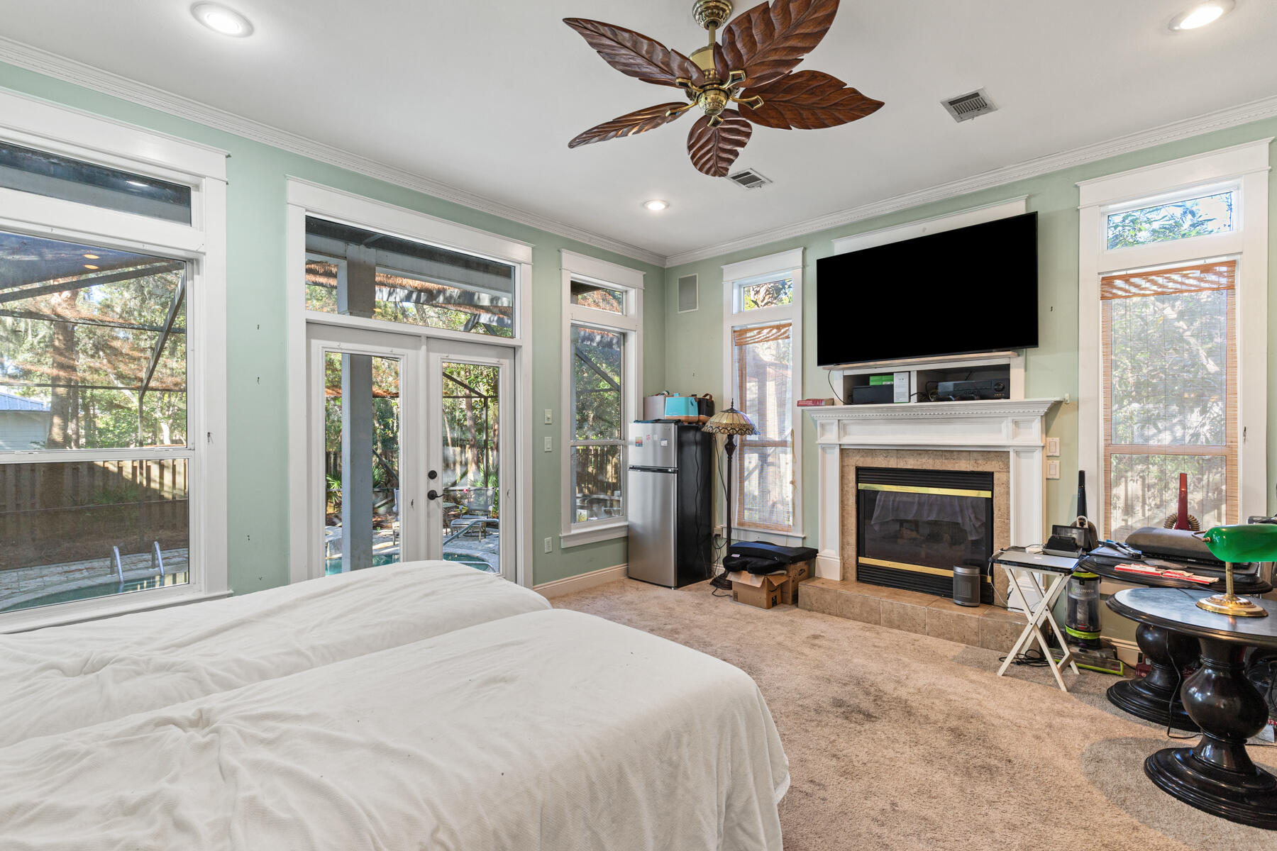 325 Botany Boulevard Santa Rosa Beach, FL 32459 - Photo 16 of 43 a bedroom with a bed and a flat screen tv