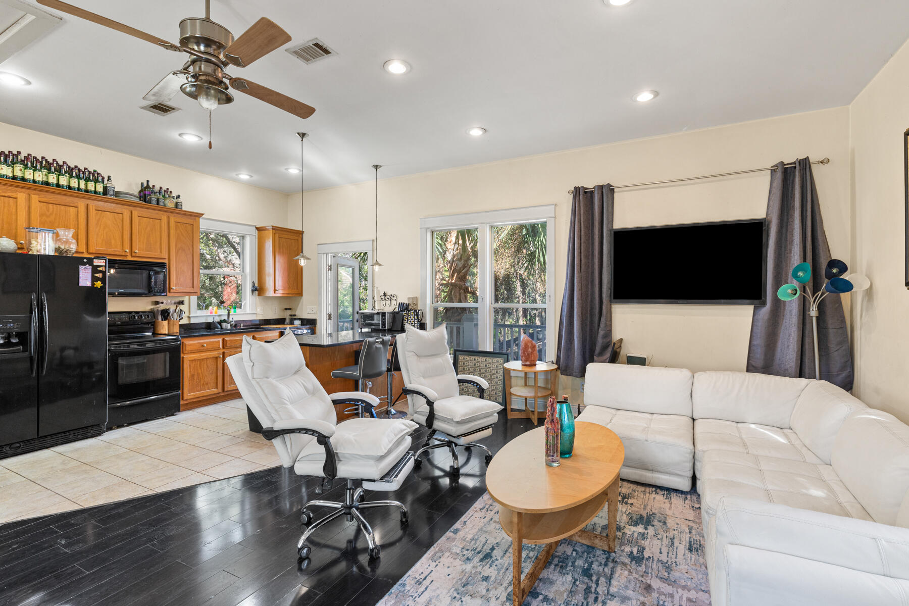 325 Botany Boulevard Santa Rosa Beach, FL 32459 - Photo 20 of 43 a living room with furniture kitchen and a flat screen tv