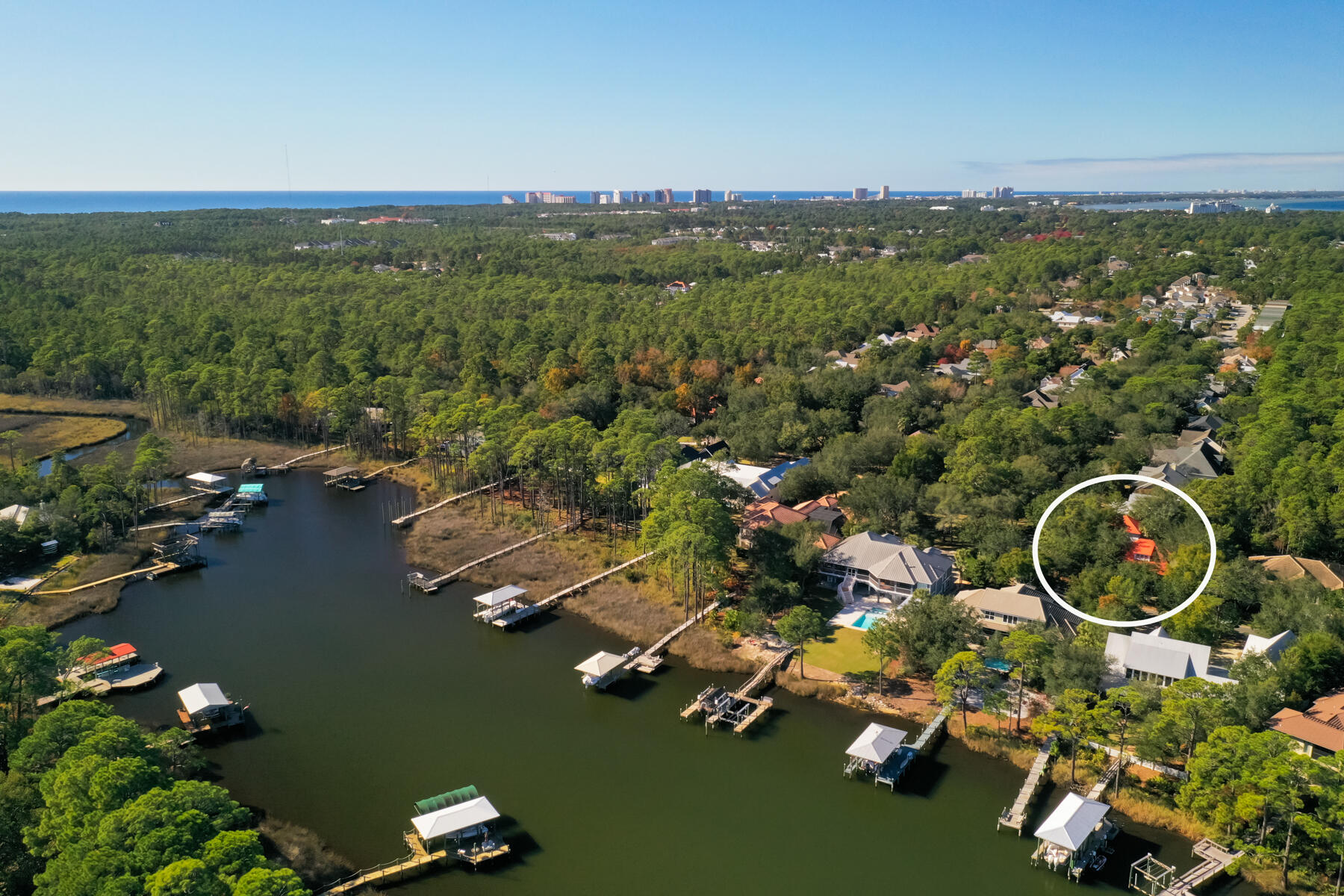 325 Botany Boulevard Santa Rosa Beach, FL 32459 - Photo 27 of 43 an aerial view of lake residential house with outdoor space and trees