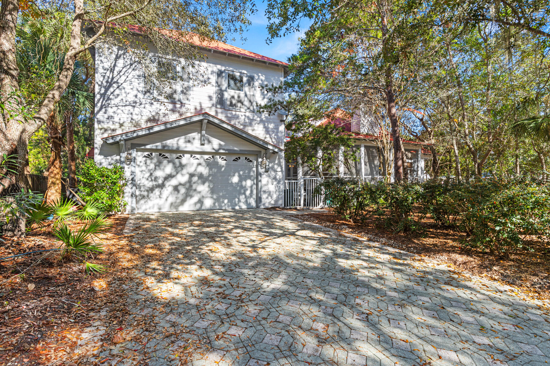 325 Botany Boulevard Santa Rosa Beach, FL 32459 - Photo 33 of 43 a view of a large tree in front of a house