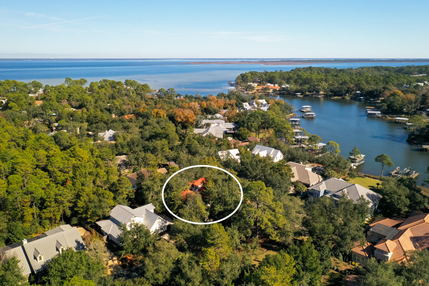 325 Botany Boulevard Santa Rosa Beach, FL 32459 - Photo 36 of 43 an aerial view of a house with a lake view