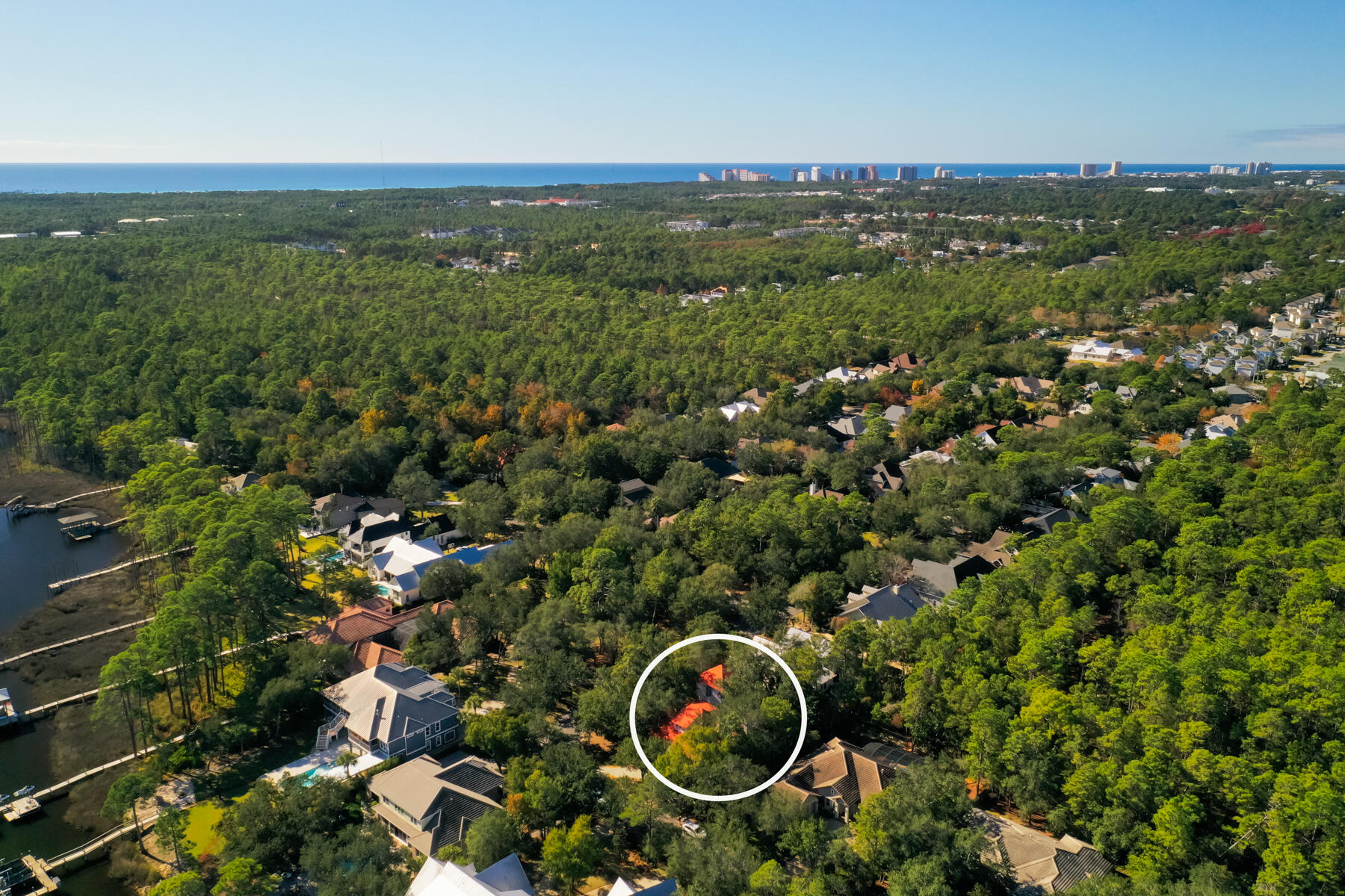 325 Botany Boulevard Santa Rosa Beach, FL 32459 - Photo 41 of 43 an aerial view of a house with a yard and lake view