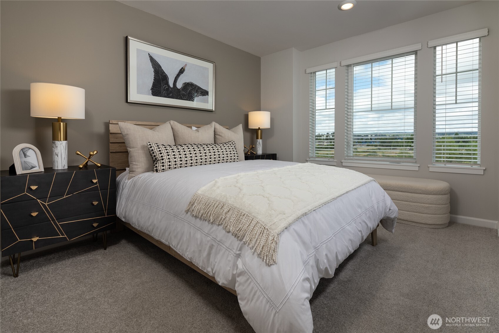 19288 Northeast 69th Circle, Unit 103 Redmond, WA 98052 - Photo 5 of 11 a bedroom with bed and window with lamp