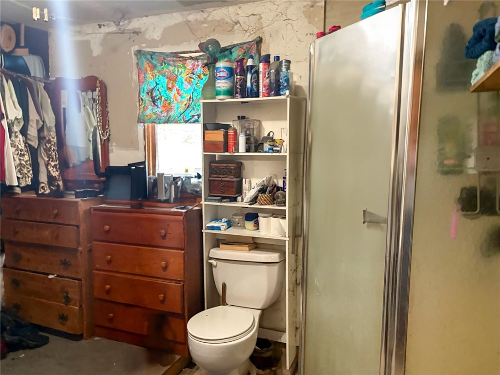 324 Henley Hornbrook Road Hornbrook, CA 96044 - Photo 7 of 9 a bathroom with a toilet sink and mirror
