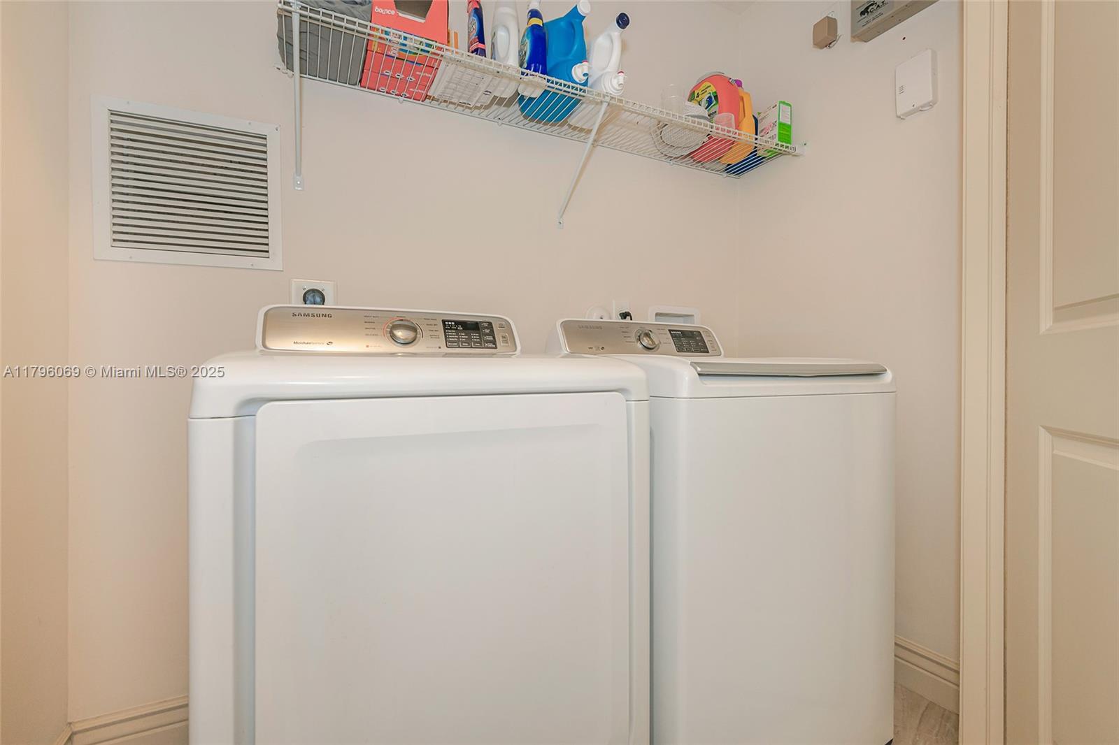 4815 Jefferson Road Delray Beach, FL 33445 - Photo 17 of 20 Laundry Closet