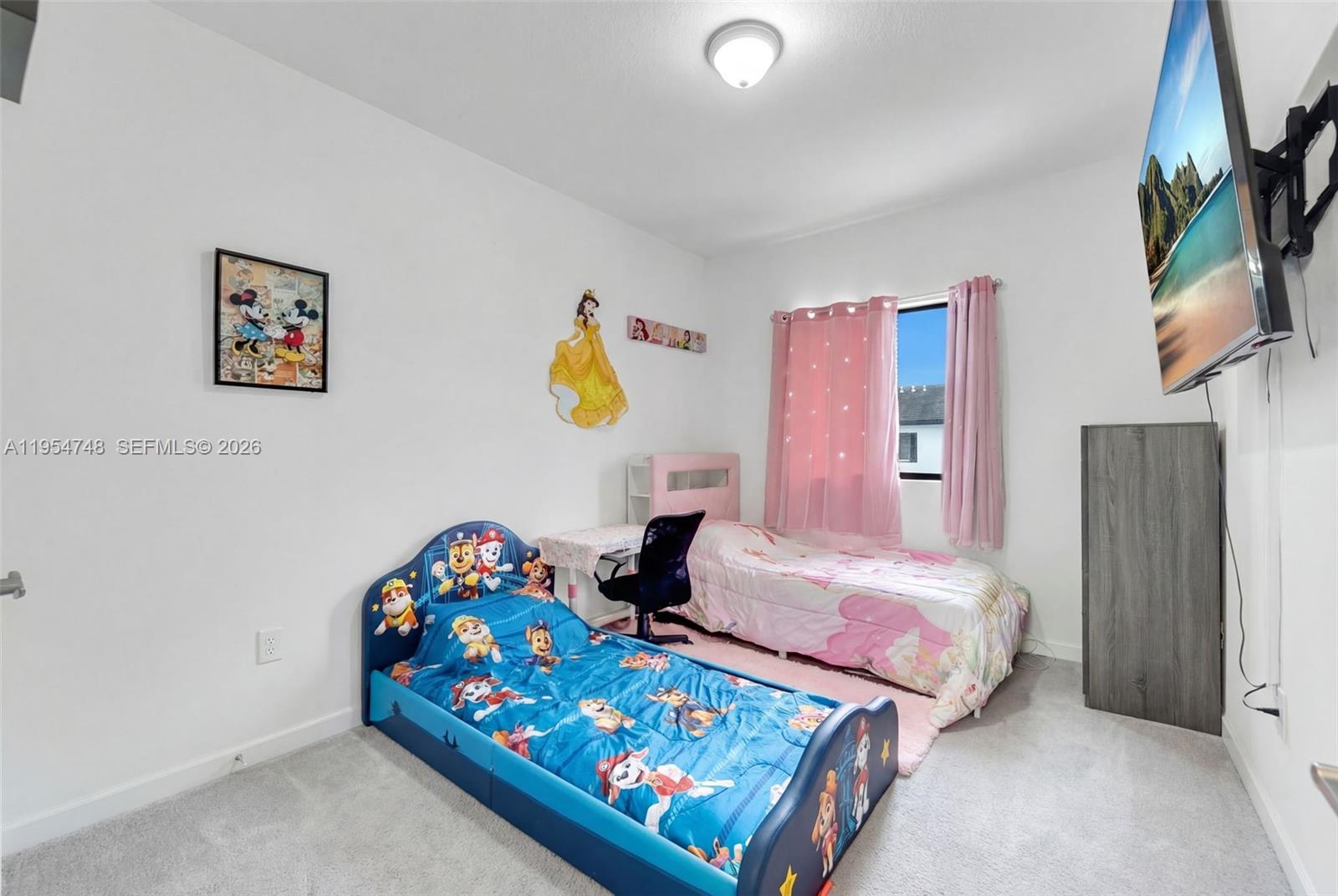 13356 Southwest 250th Street Homestead, FL 33032 - Photo 13 of 21 a bedroom with two beds and a painting on the wall