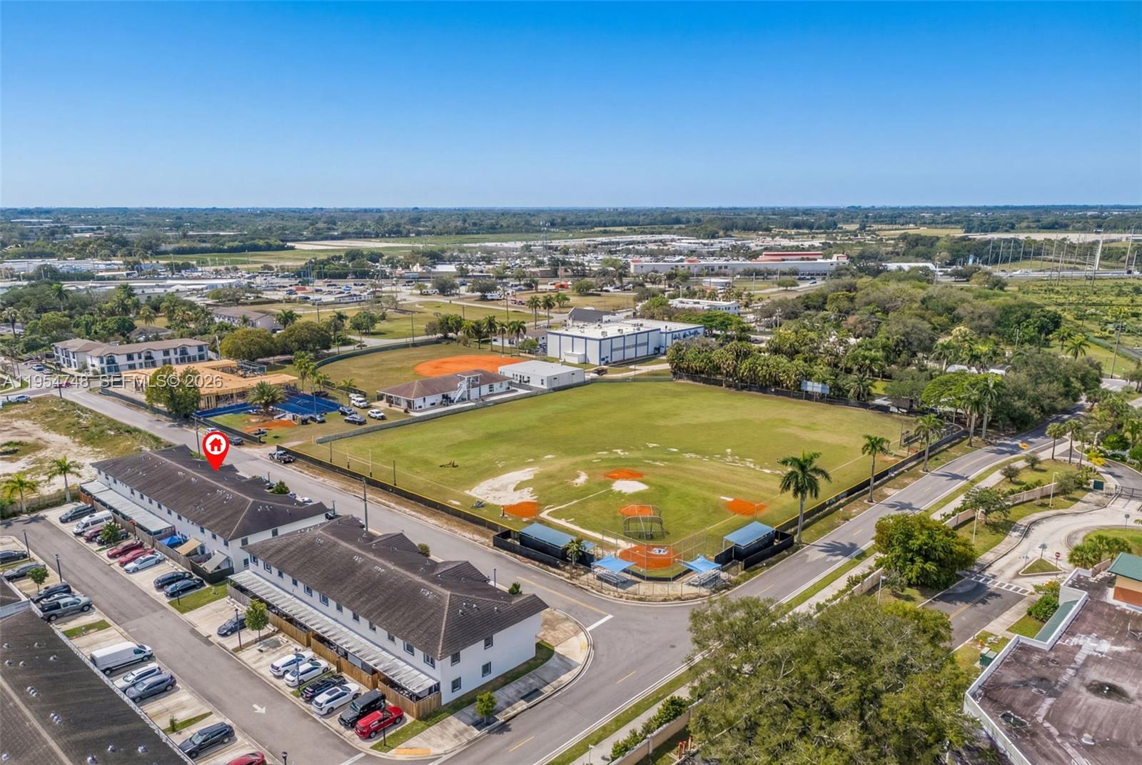13356 Southwest 250th Street Homestead, FL 33032 - Photo 21 of 21 an aerial view of a tennis court