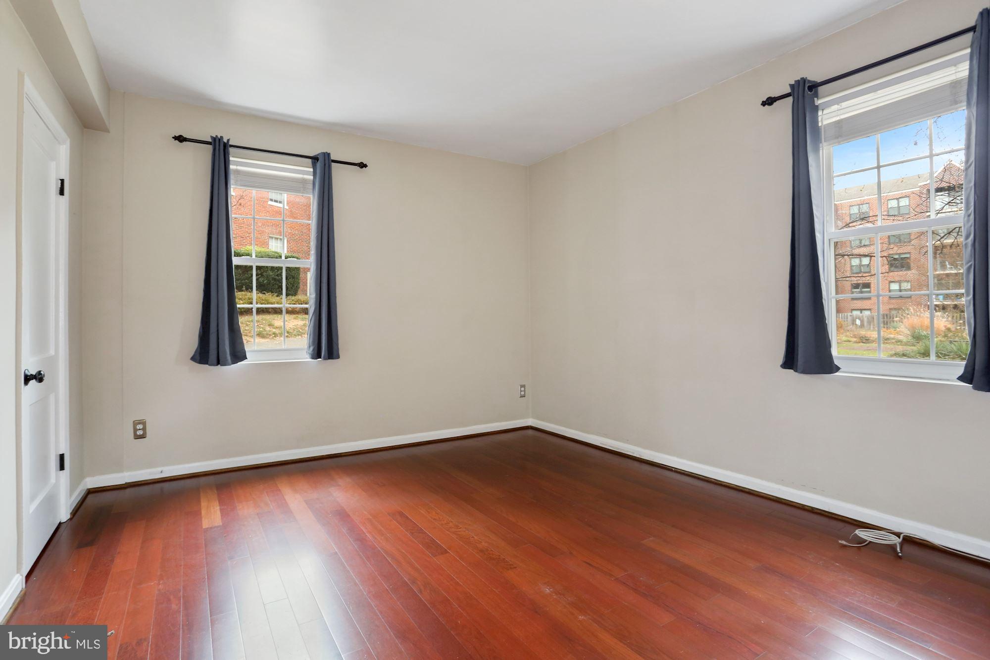 1900 North Rhodes Street, Unit 69 Arlington, VA 22201 - Photo 17 of 19 Hardwood Floors in Bedroom