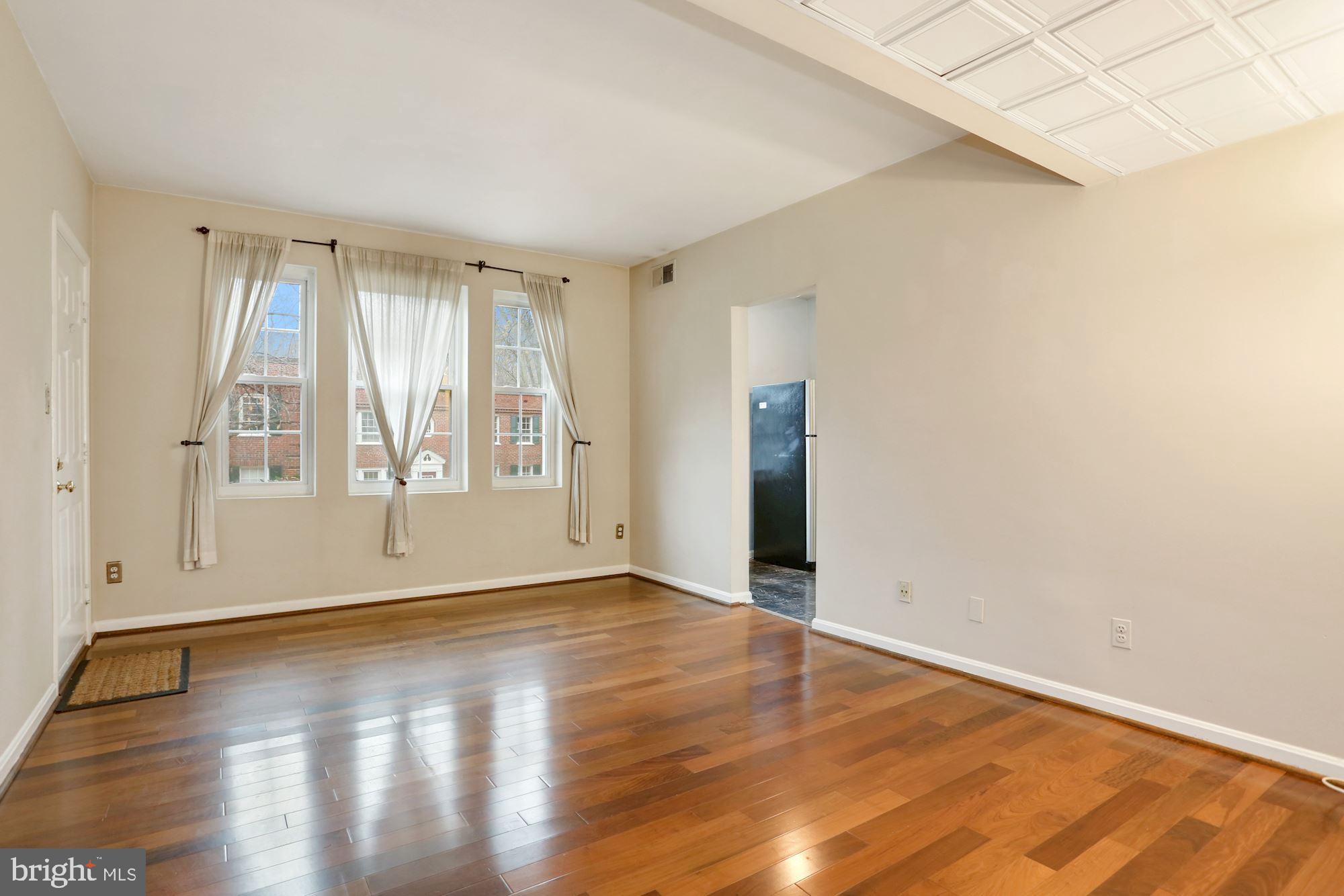 1900 North Rhodes Street, Unit 69 Arlington, VA 22201 - Photo 4 of 19 Spacious Living Area