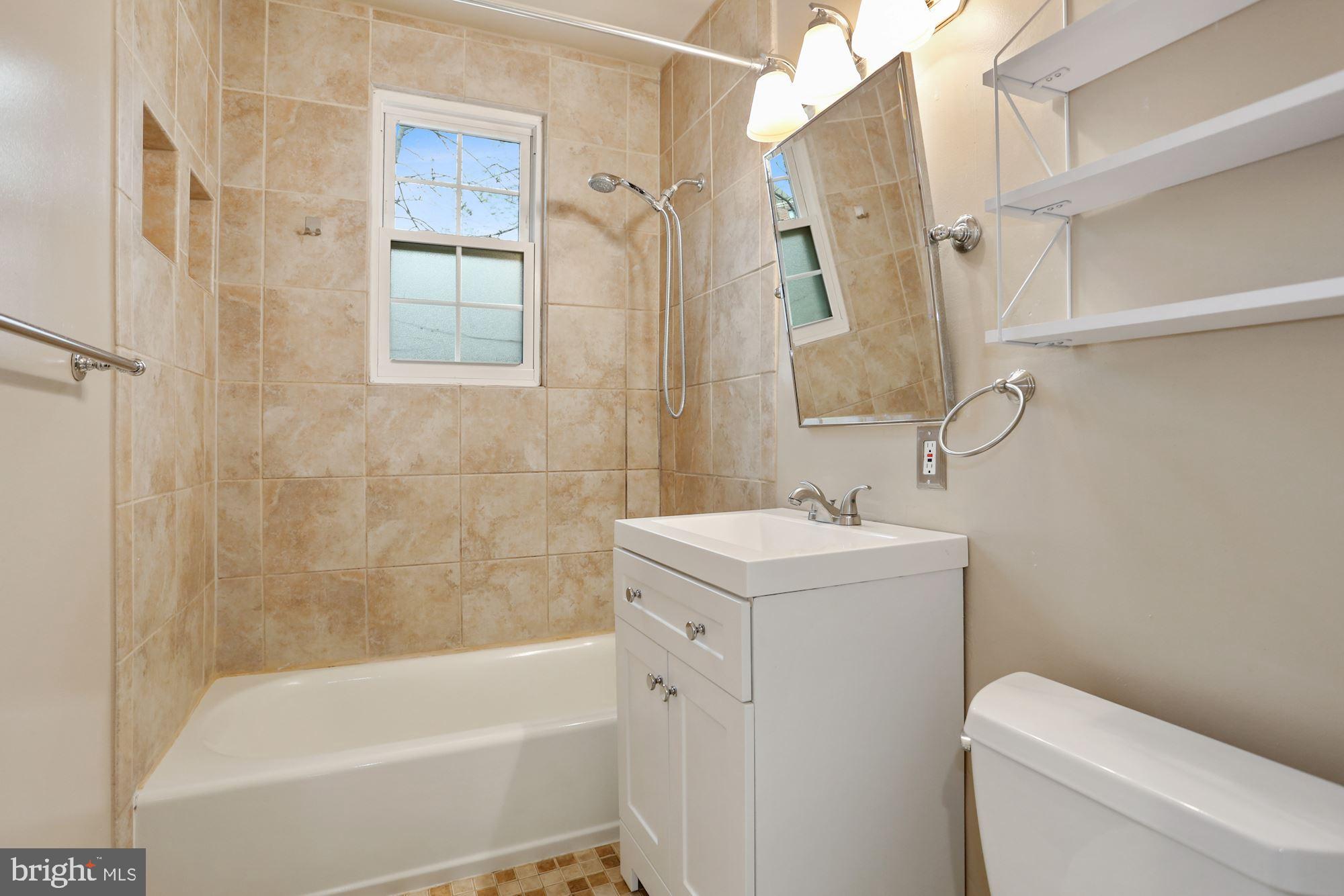 1900 North Rhodes Street, Unit 69 Arlington, VA 22201 - Photo 6 of 19 Beautifully Renovated Bathroom