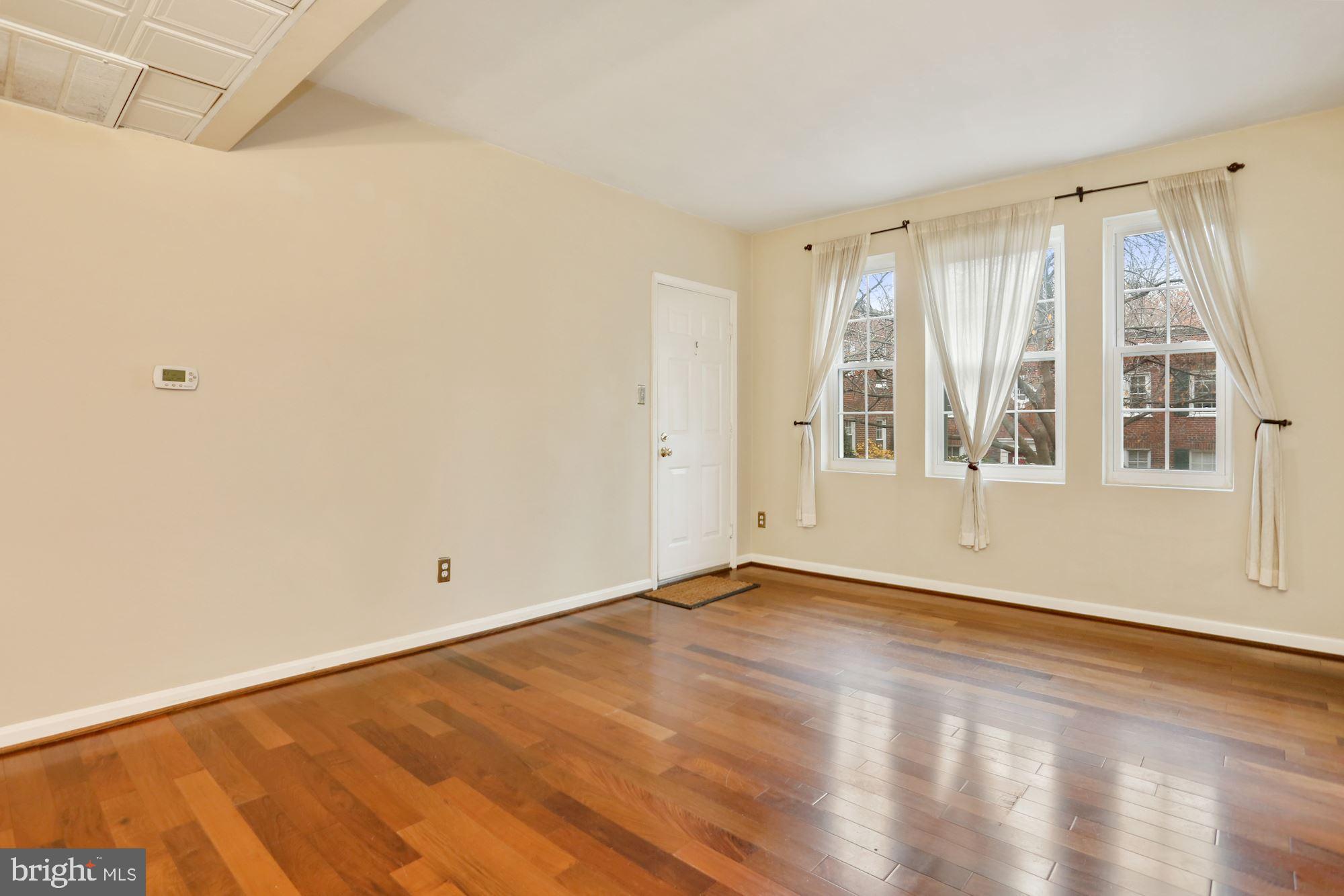 1900 North Rhodes Street, Unit 69 Arlington, VA 22201 - Photo 8 of 19 Hardwood Floors in Living Room