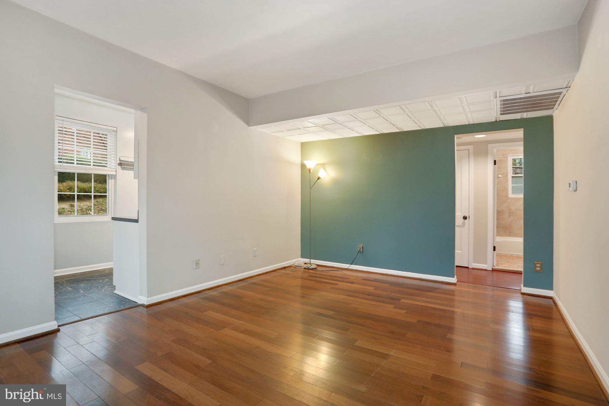 1900 North Rhodes Street, Unit 69 Arlington, VA 22201 - Photo 10 of 19 Living Room - View into Kitchen and Hallway