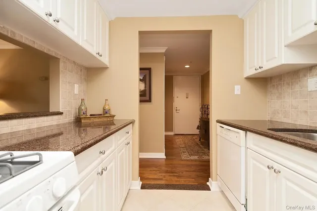 a bedroom with a bed and a television in it