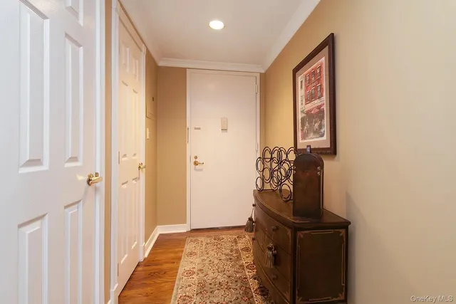 a kitchen with stainless steel appliances granite countertop a sink and a refrigerator