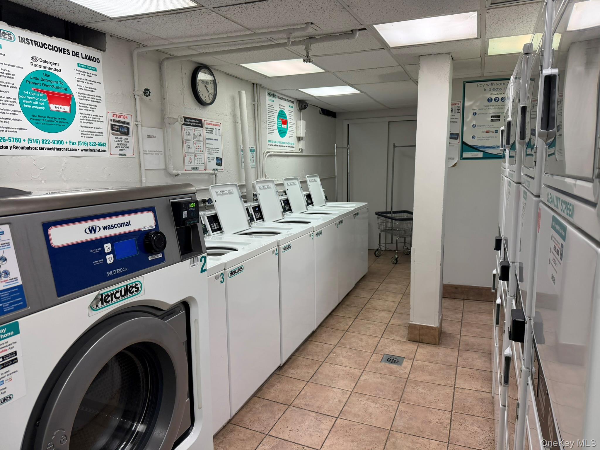 755 Bronx River Road, Unit 1C Bronxville, NY 10708 - Photo 15 of 16 a kitchen with a sink a stove and cabinets