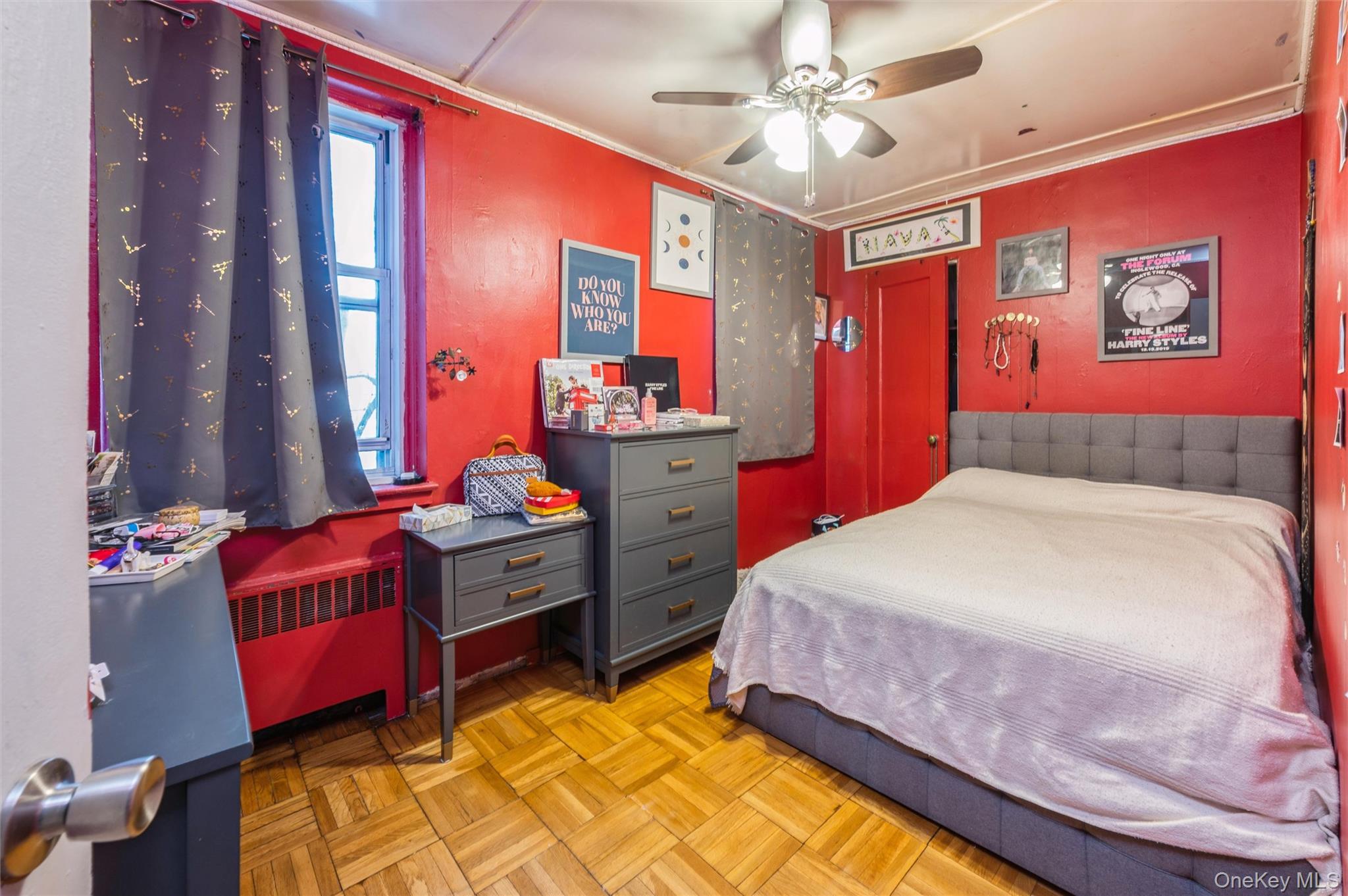 755 Bronx River Road, Unit 1C Bronxville, NY 10708 - Photo 9 of 16 a bed room with a bed and a chandelier