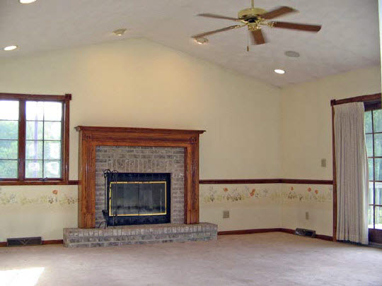 1723 East Spring Creek Road Oregon, IL 61061 - Photo 5 of 6 a living room with a fireplace