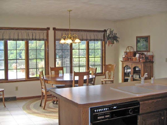 1723 East Spring Creek Road Oregon, IL 61061 - Photo 6 of 6 a view of a dining room with furniture window and outside view