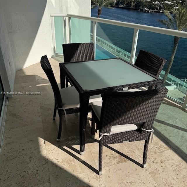 20201 East Country Club Drive, Unit 409 Aventura, FL 33180 - Photo 4 of 12 a view of balcony with furniture and outdoor