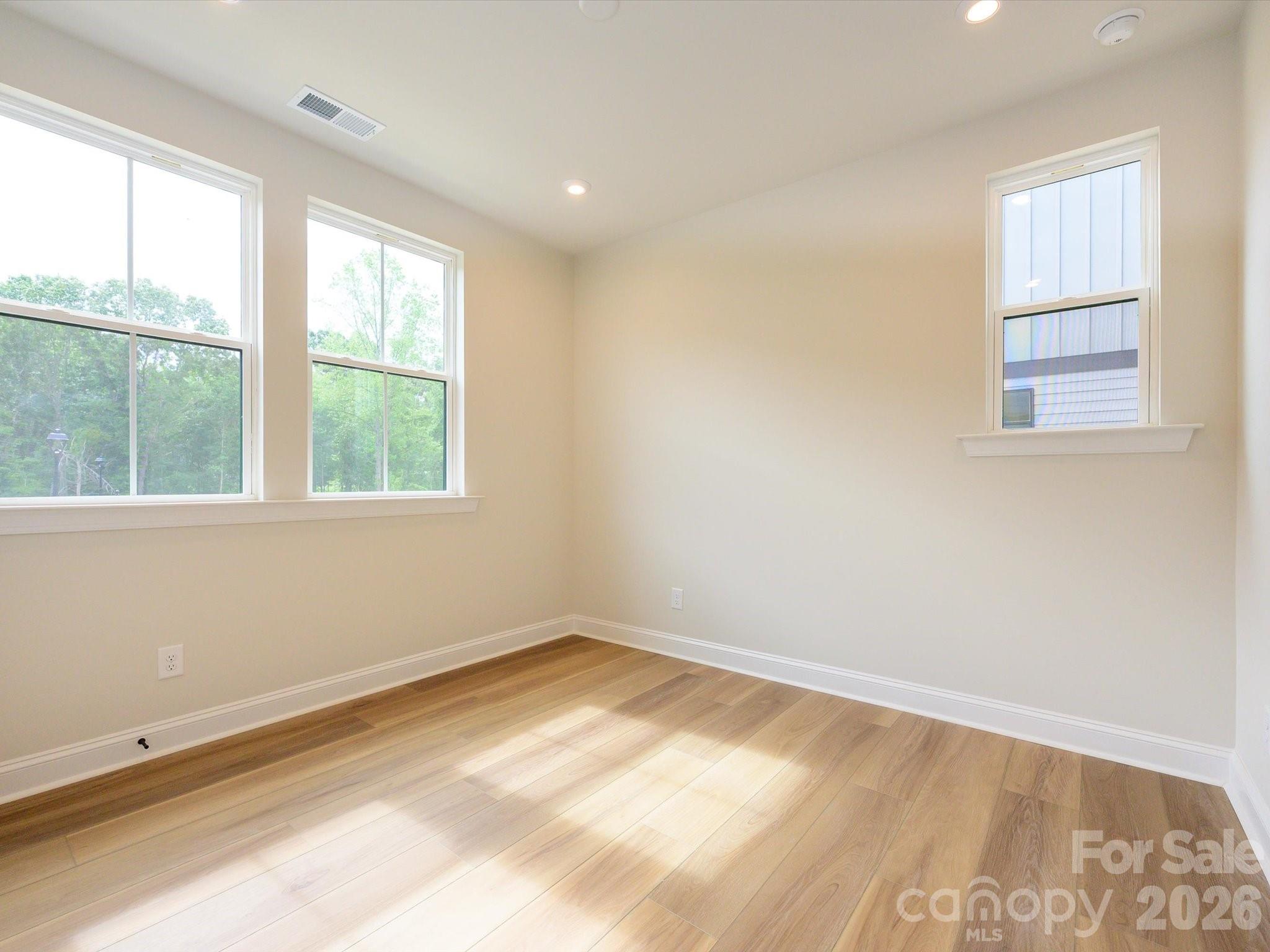 403 Old Town Vlg Road Waxhaw, NC 28173 - Photo 4 of 23 an empty room with a window