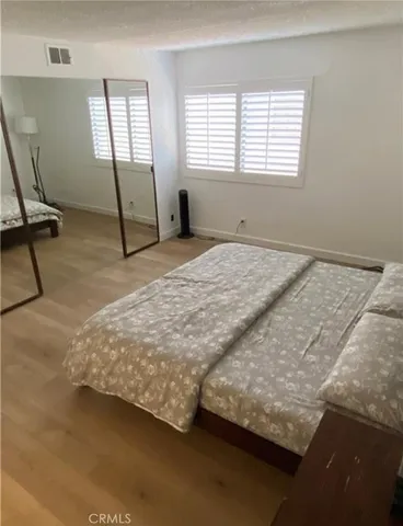 a bathroom with a sink double vanity and a mirror