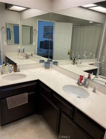 a bathroom with a tub and shower