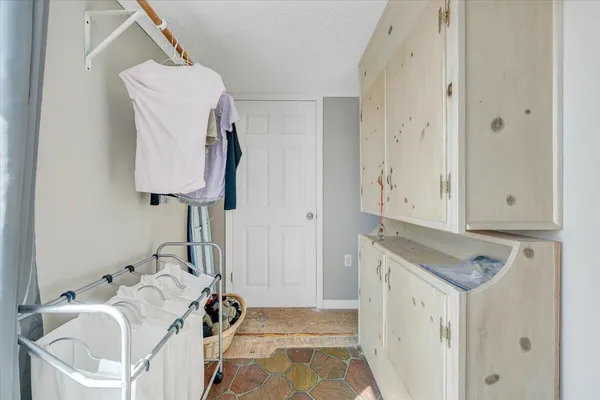 a bathroom with a sink and mirror