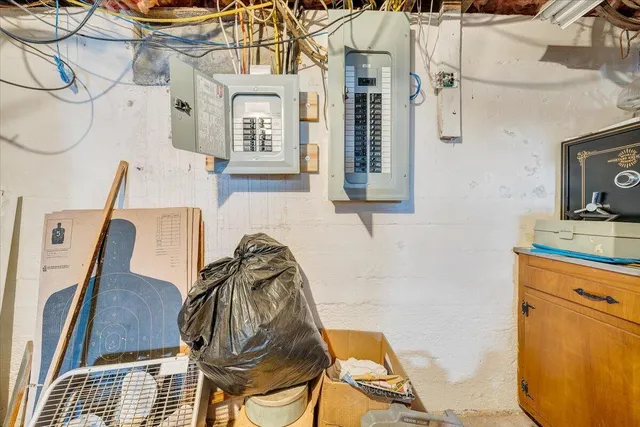 a view of a kitchen with furniture and windows