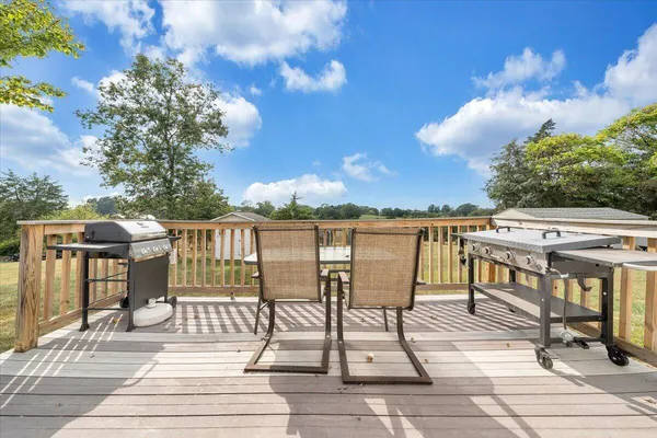 a view of a chairs and table on the terrace