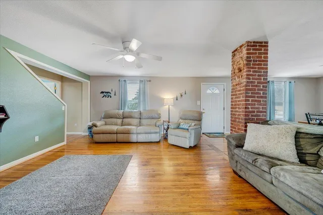 a living room with furniture and a couch