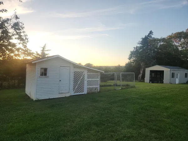 a view of a backyard of the house