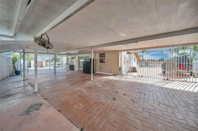 a view of an empty room with a balcony