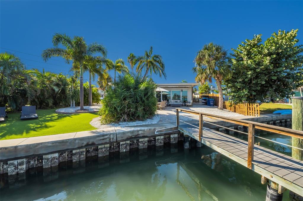 16101 Redington Drive Redington Beach, FL 33708 - Photo 11 of 43 a view of a swimming pool with lounge chair