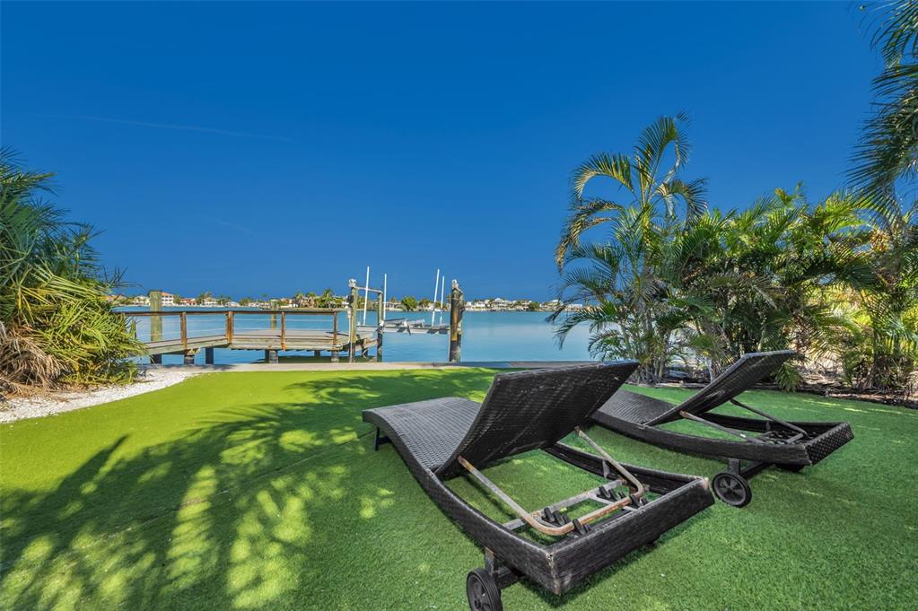16101 Redington Drive Redington Beach, FL 33708 - Photo 15 of 43 a view of a backyard with sitting area