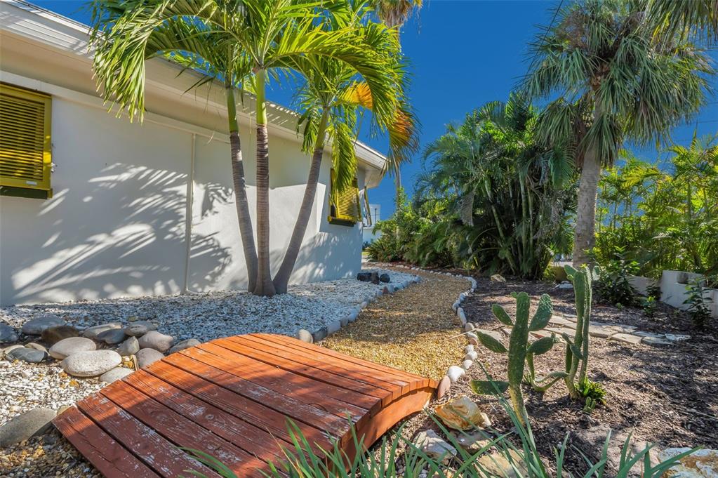 16101 Redington Drive Redington Beach, FL 33708 - Photo 19 of 43 a backyard of a house with seating space