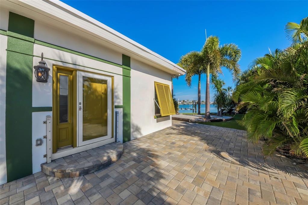 16101 Redington Drive Redington Beach, FL 33708 - Photo 2 of 43 a view of a house with a yard