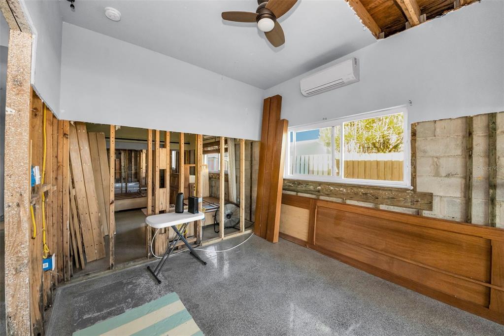 16101 Redington Drive Redington Beach, FL 33708 - Photo 21 of 43 a bedroom with furniture and window