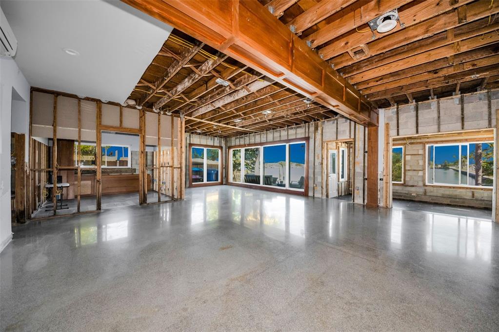 16101 Redington Drive Redington Beach, FL 33708 - Photo 27 of 43 a view of a hall with stairs and a large window