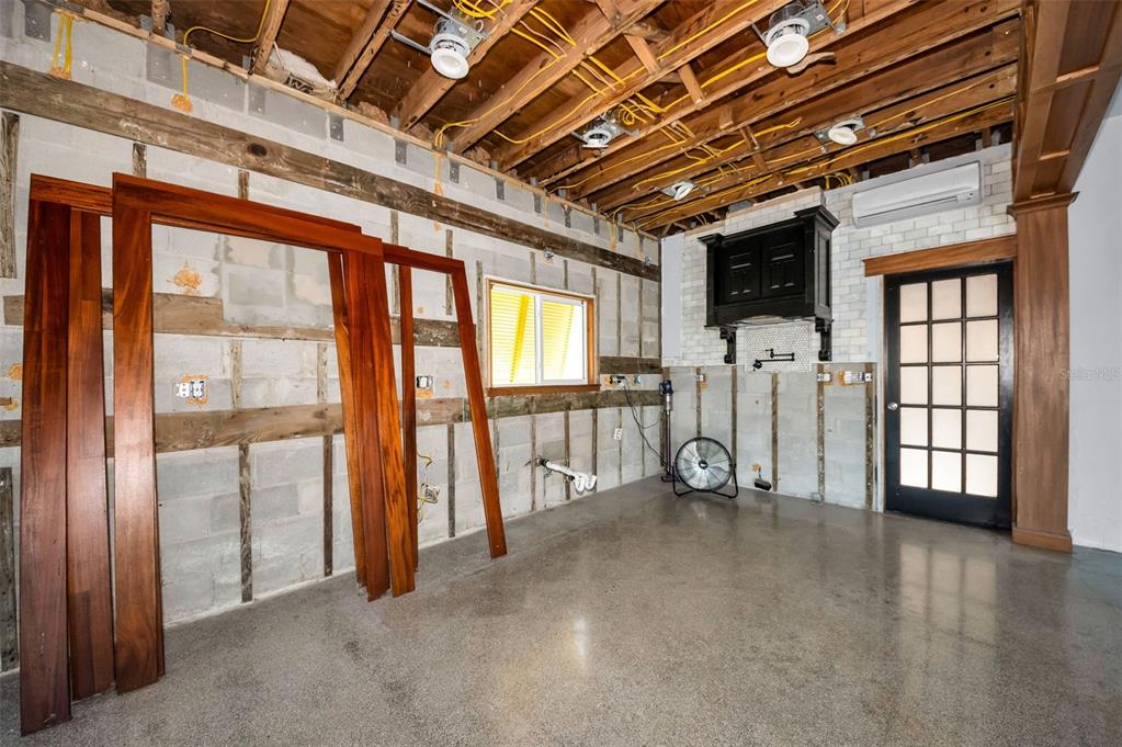 16101 Redington Drive Redington Beach, FL 33708 - Photo 29 of 43 a view of an empty room with windows