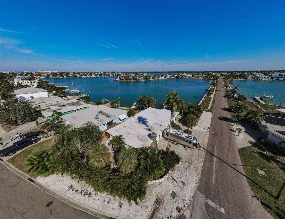 16101 Redington Drive Redington Beach, FL 33708 - Photo 7 of 43 a view of a lake with houses